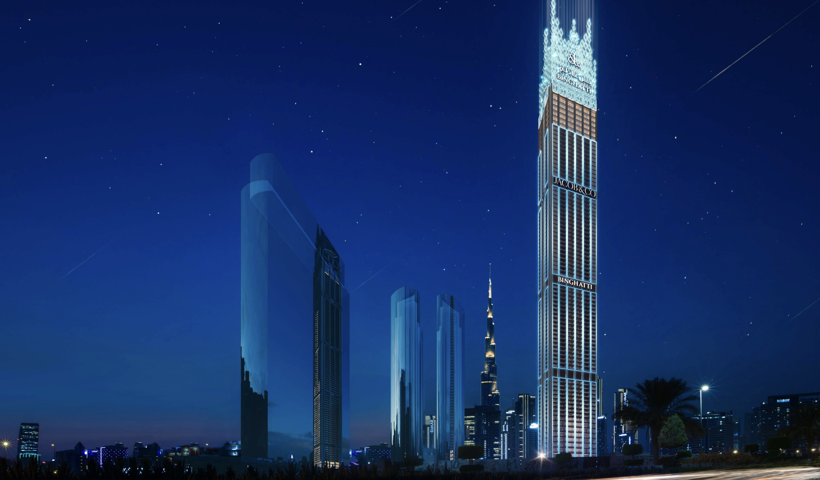 Burj Binghatti illuminated against night skyline